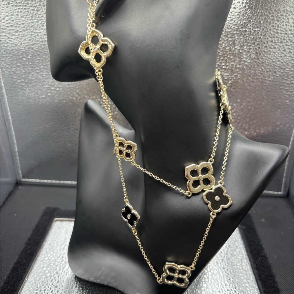 Elegant Gold and Black Floral Necklace